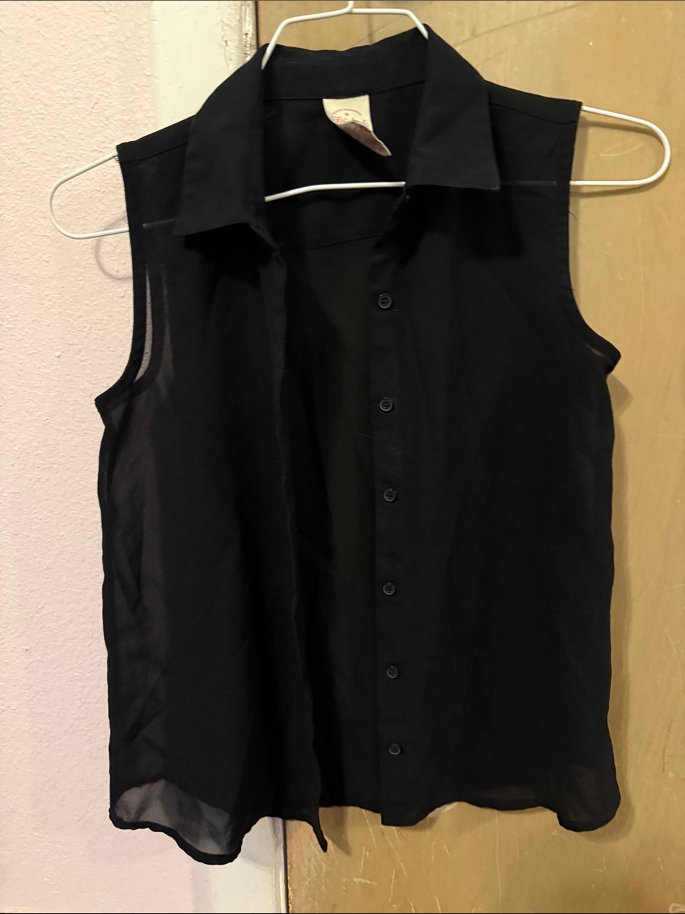 Share a black shirt that button down